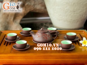 Bộ ấm chén dẹt gốm khắc đào đỏ