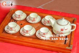 Bộ ấm chén dẹt vẽ đào men kem