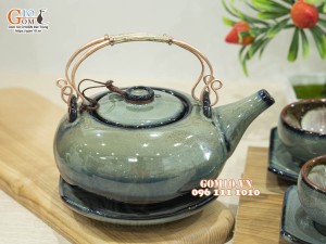 Bộ ấm chén giang tây men hỏa biến xanh ngọc, chén lòng hoa