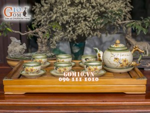 Bộ ấm chén gốc cây men vuốt, vẽ mai vàng 350ml