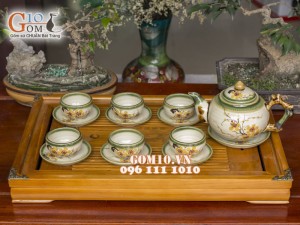 Bộ ấm chén gốc cây men vuốt, vẽ mai vàng 500ml