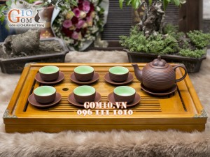 Bộ ấm chén gốm dáng măng cụt nâu, chén lòng xanh