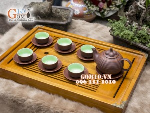 Bộ ấm chén gốm dáng măng cụt nâu, chén lòng xanh