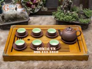 Bộ ấm chén gốm dáng măng cụt nâu, chén lòng xanh