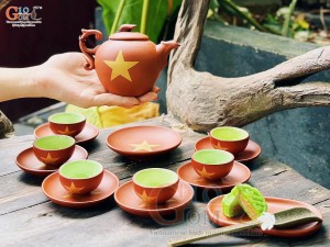 Bộ ấm chén gốm dáng tròn, in Sao vàng