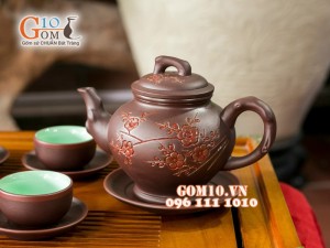 Bộ ấm chén gốm khắc đào đỏ