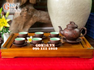 Bộ ấm chén gốm khắc đào đỏ