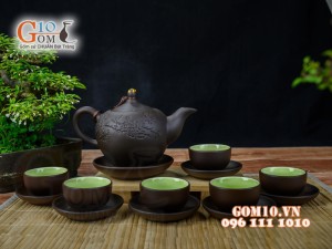 Bộ ấm chén gốm tử sa khắc hoa đào đen