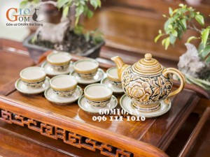 Bộ ấm chén khắc nổi hoa phù dung chân cao
