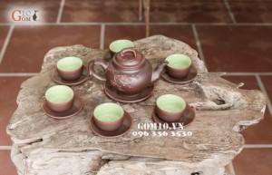 Bộ ấm chén men gốm dáng Báo xuân cao, đắp hoa đào