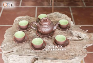 Bộ ấm chén men gốm dáng Báo xuân cao, đắp hoa đào