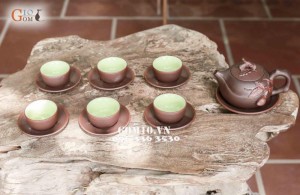 Bộ ấm chén men gốm dáng Trường Thọ, đắp đào