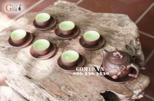 Bộ ấm chén men gốm dáng Trường Thọ, đắp đào