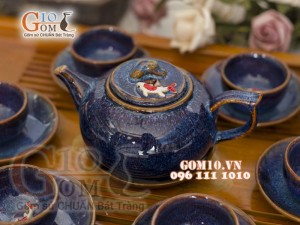 Bộ ấm chén men hỏa biến chén đắp nổi hình Cá