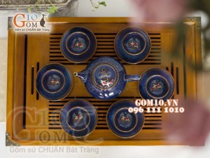 Bộ ấm chén men hỏa biến chén đắp nổi hình Cá