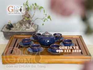 Bộ ấm chén men hỏa biến chén đắp nổi hình Cá