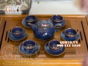 Bộ ấm chén men hỏa biến chén đắp nổi hình Cá