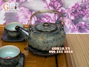 Bộ ấm chén men hỏa biến chén lòng cá