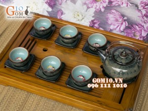 Bộ ấm chén men hỏa biến chén lòng cá