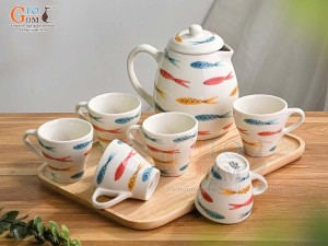 Bộ ấm chén men kem vẽ cá đàn, 1 Lít