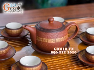 Bộ ấm chén dáng tròn gốm hồng sa chỉ đen, 300ml