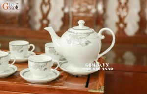 Bộ ấm chén men trắng dáng Camellia vẽ hoa kim