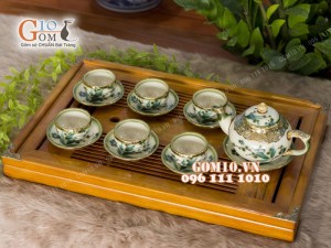 Bộ ấm chén men vuốt dáng chóp vẽ tre, bọc đồng