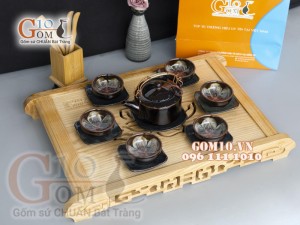 Bộ ấm chén men hoả biến quai đồng, chén lòng hoa