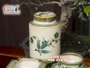 Bộ ấm chén quả đào men vuốt, vẽ tre xanh 750ml, 3 món phụ kiện