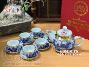 Bộ ấm chén quả hồng men lam cổ họa tiết Trúc Lâm Thất Hiền bọc đồng - in logo