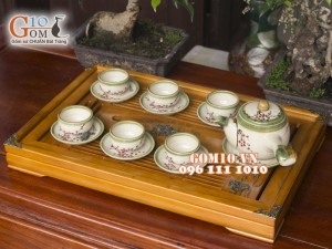 Bộ ấm chén quai ngang men vuốt, vẽ hoa đào