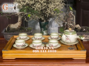 Bộ ấm chén quai ngang men vuốt, vẽ hoa đào