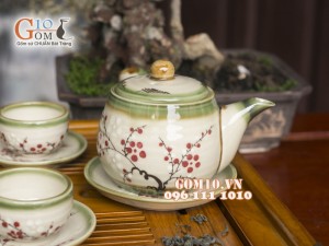 Bộ ấm chén quai ngang men vuốt, vẽ hoa đào
