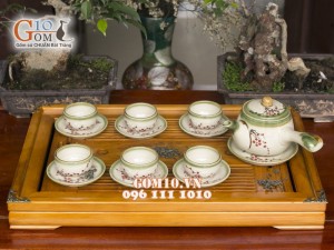 Bộ ấm chén quai ngang men vuốt, vẽ hoa đào