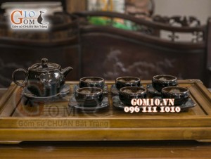 Bộ ấm chén quai tròn đen men hỏa biến, chén lòng hoa 300ml