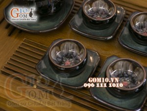 Bộ ấm chén quai tròn đen men hỏa biến, chén lòng hoa 300ml