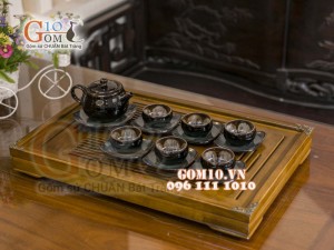 Bộ ấm chén quai tròn đen men hỏa biến, chén lòng hoa 300ml