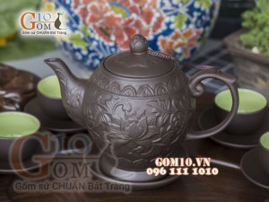 Bộ ấm chén tử sa dáng quả đào khắc sen