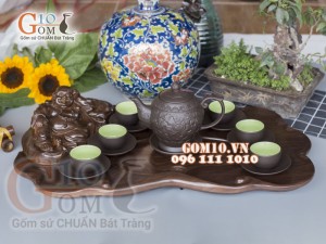 Bộ ấm chén tử sa dáng quả đào khắc sen