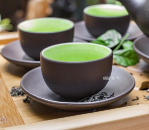 Bộ ấm chén tử sa đắp lá nho, 3 chân, chén lòng xanh