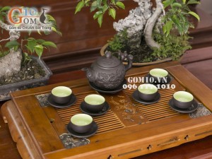 Bộ ấm chén tử sa đắp nổi hoa châm đen