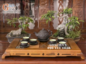 Bộ ấm chén tử sa đắp nổi hoa châm đen