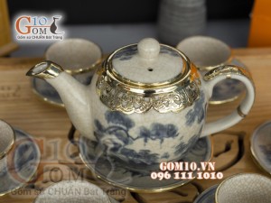 Bộ ấm chén dáng đào men rạn cổ bọc đồng 600ml