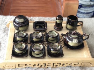 Bộ ấm chén dáng quả hồng men hoả biến chén lòng hoa màu mật ong