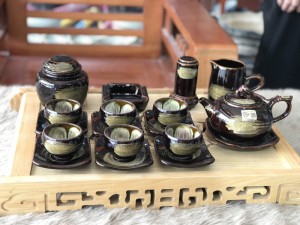 Bộ ấm chén dáng quả hồng men hoả biến chén lòng hoa màu mật ong