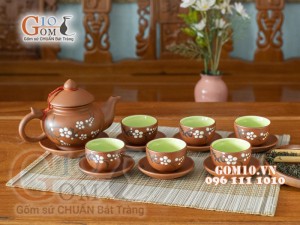 Bộ ấm chén gốm dáng quả hồng vẽ hoa mai trắng 350ml