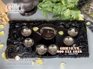 Bộ ấm chén men hoả biến đen, chén lòng hoa