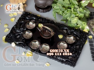 Bộ ấm chén men hoả biến đen, chén lòng hoa