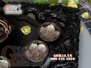 Bộ ấm chén men hoả biến đen, chén lòng hoa