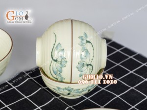 Bộ đồ ăn men kem vẽ sen xanh chỉ nâu